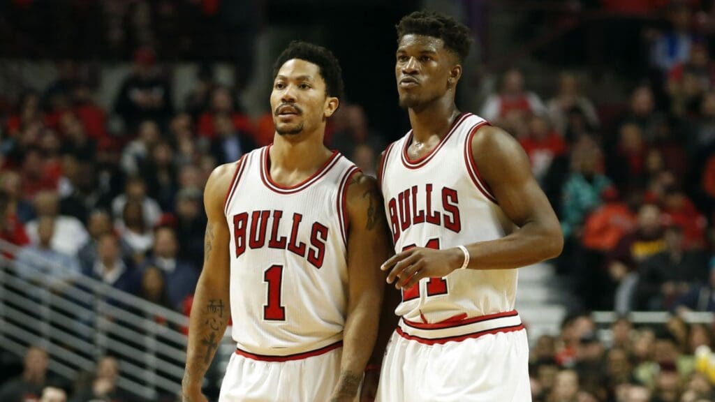 Apr 27, 2015; Chicago, IL, USA; Chicago Bulls guard Derrick Rose (1) and guard Jimmy Butler (21) talk to each other against the Milwaukee Bucks in game five of the first round of the 2015 NBA Playoffs at United Center. The Bucks won 94-88.