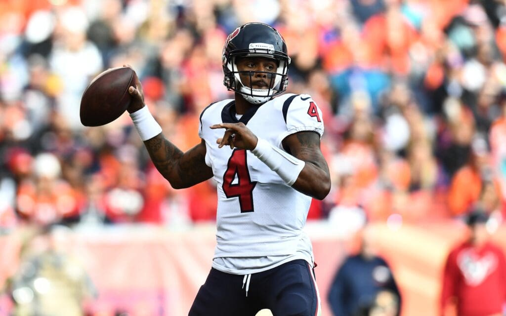 Nov 4, 2018; Denver, CO, USA; Houston Texans quarterback Deshaun Watson (4) looks to pass the ball in the second quarter against the Denver Broncos at Broncos Stadium at Mile High.