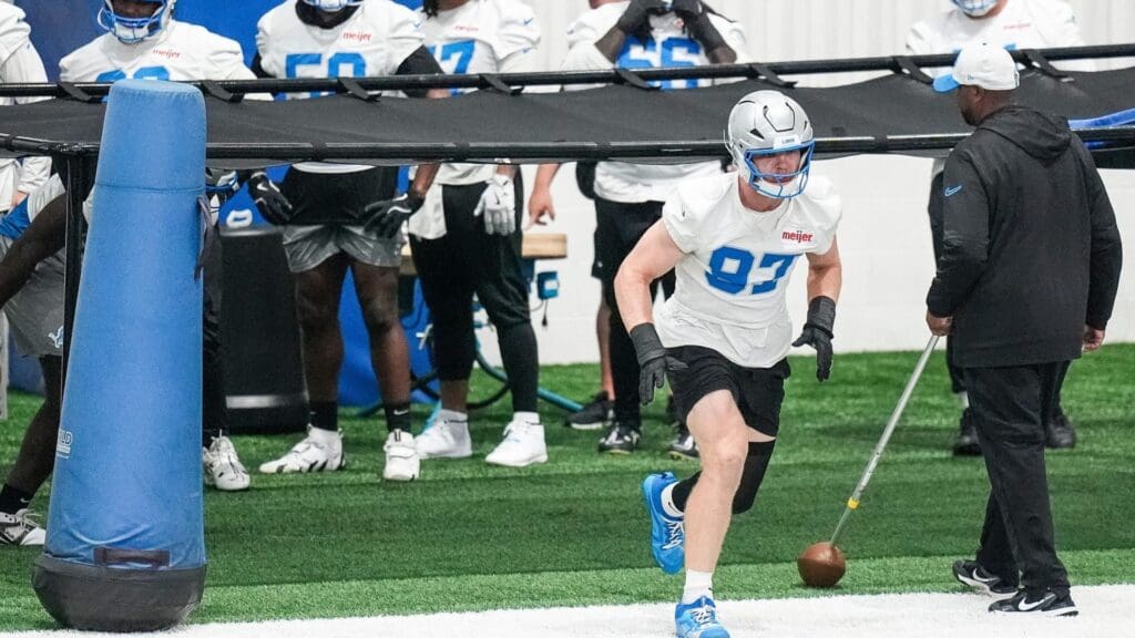 Detroit Lions defensive end Aidan Hutchinson (97) practices during OTA at Meijer Performance Center in Allen Park on Thursday, June 5, 2025.