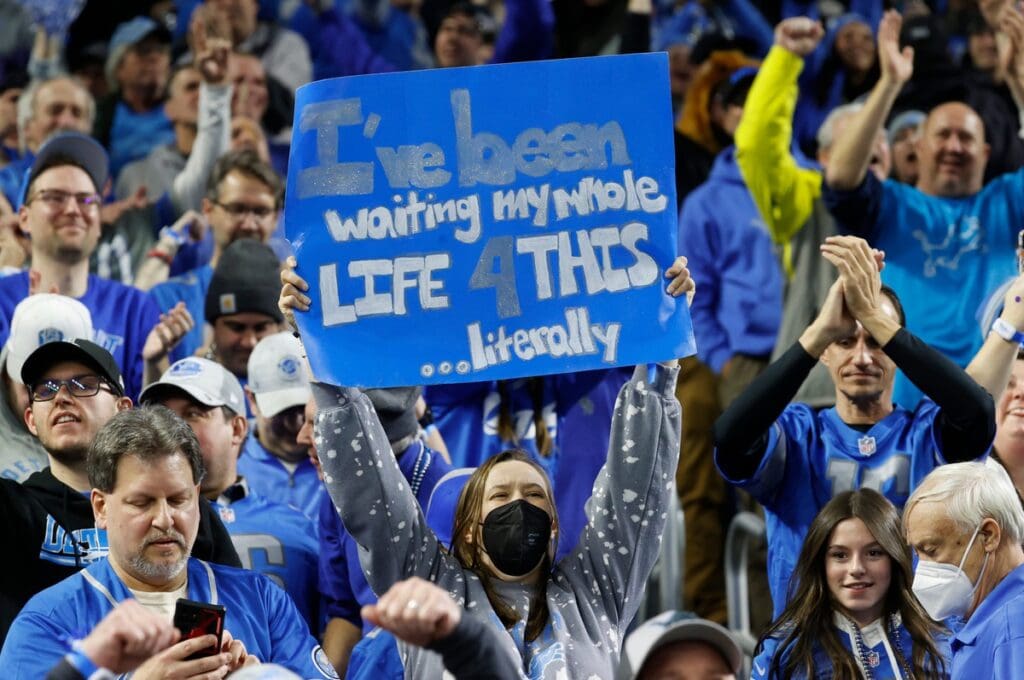 Detroit Lions fans celebrate after the Lions beat the L.A. Rams, 24-23 in the wild-card round of the NFC playoffs at Ford Field in Detroit on Sunday, January 14, 2023.
