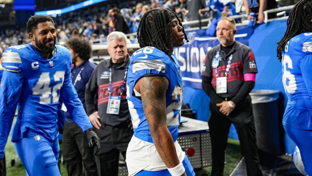 Detroit Lions running back Jahmyr Gibbs walks off the field after losing to the Washington Commanders 45-31 in the NFC divisional round playoff game at Ford Field in Detroit, Saturday, Jan. 18, 2025.