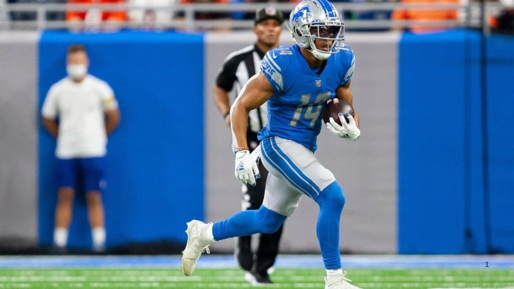 Oct 17, 2021; Detroit, Michigan, USA; Detroit Lions wide receiver Amon-Ra St. Brown (14) runs with the ball during the fourth quarter against the Cincinnati Bengals at Ford Field.