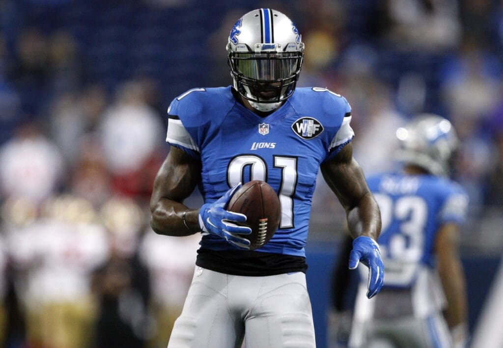 Dec 27, 2015; Detroit, MI, USA; Detroit Lions wide receiver Calvin Johnson (81) holds the ball before the game against the San Francisco 49ers at Ford Field