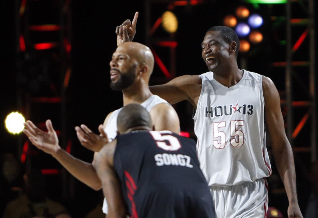 Feb 15, 2013; Houston, TX, USA; NBA former player Dikembe Mutombo (55) wags his finger after blocking the shot of Tamika Catchings (not pictured) during the 2013 NBA all star celebrity game at the George R. Brown Convention Center.