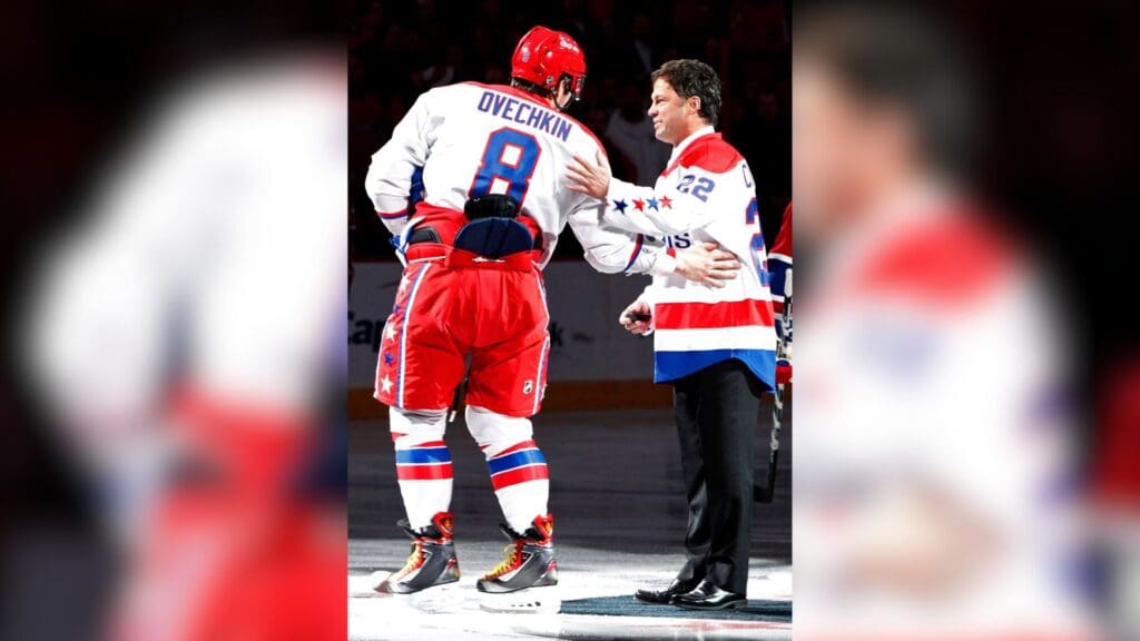 February 1, 2011; Washington, DC, USA; Washington Capitals left wing Alex Ovechkin (8) shakes hands at center ice with former Capitals player and NHL Hall of Famer Dino Ciccarelli (R) prior to the Capitals game against the Montreal Canadiens at Verizon Center. The Canadiens won 3-2 in a shootout.