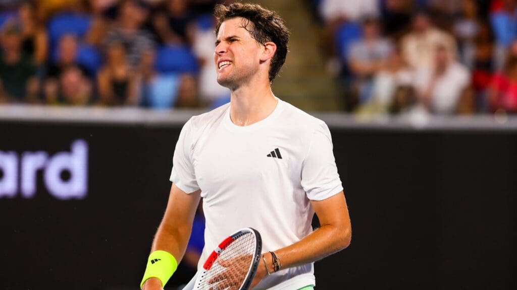 Jan 15, 2024; Melbourne, Victoria, Australia; Dominic Thiem of Austria loses a point against Felix Auger Aliassime (not pictured) of Canada in Round 1 of the Men's Singles on Day 2 of the Australian Open tennis at Rod Laver Arena.