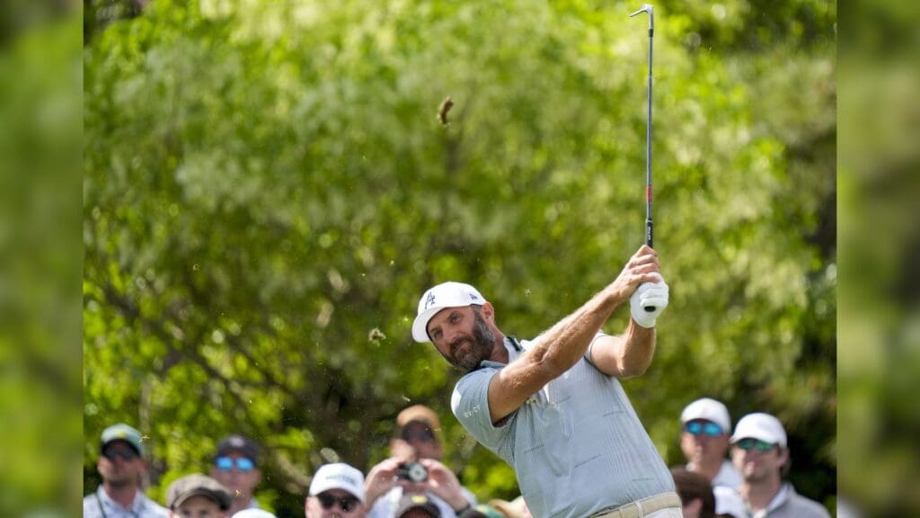 Apr 9, 2025; Augusta, Georgia, USA; Dustin Johnson tees off on no. 3 during the Par 3 Contest at Augusta National Golf Club.