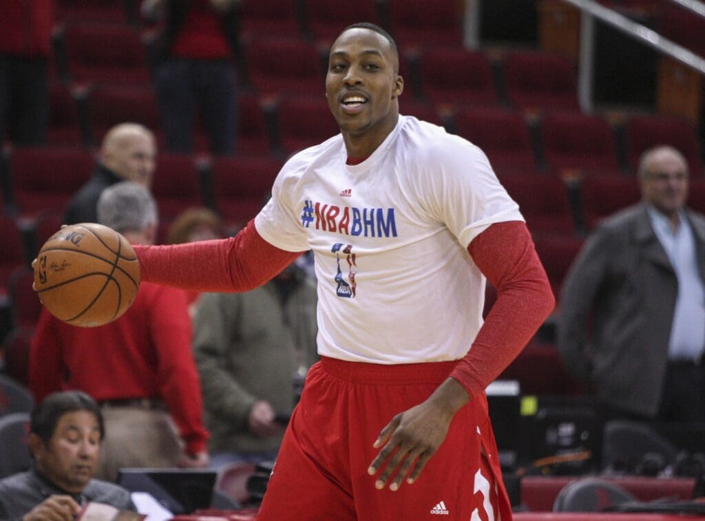Feb 12, 2014; Houston, TX, USA; Houston Rockets center Dwight Howard (12) warms up before a game against the Washington Wizards at Toyota Center.