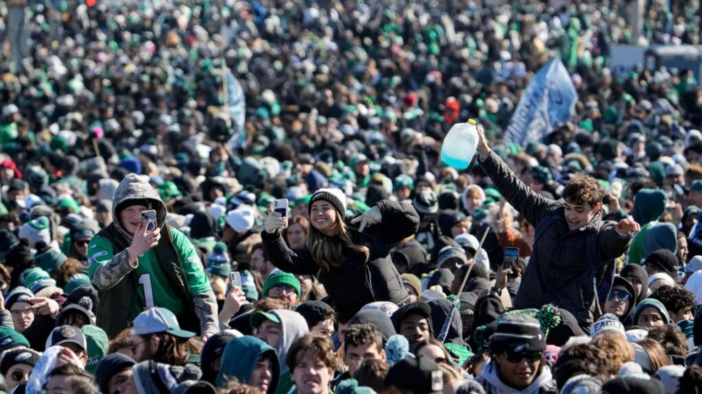 Eagles fans get a boost from friends as they await the Philadelphia Eagles Super Bowl celebration in front of the Philadelphia Museum of Art, Friday, Feb. 14, 2025.