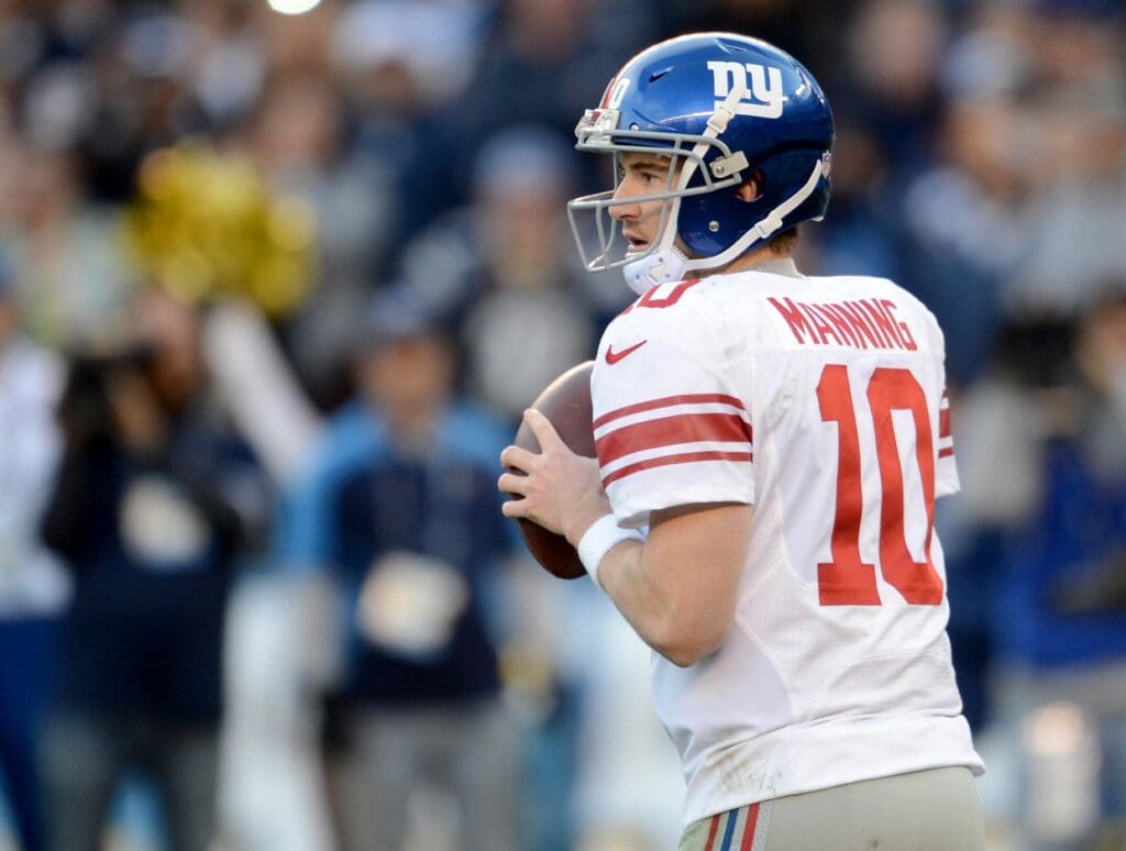 Dec 8, 2013; San Diego, CA, USA; New York Giants quarterback Eli Manning (10) sets to pass in the fourth quarter of the game against the San Diego Chargers at Qualcomm Stadium.