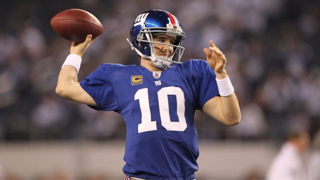 Dec 11, 2011; Dallas, TX, USA; New York Giants quarterback Eli Manning (10) throws prior to the game against the Dallas Cowboys at Cowboys Stadium.