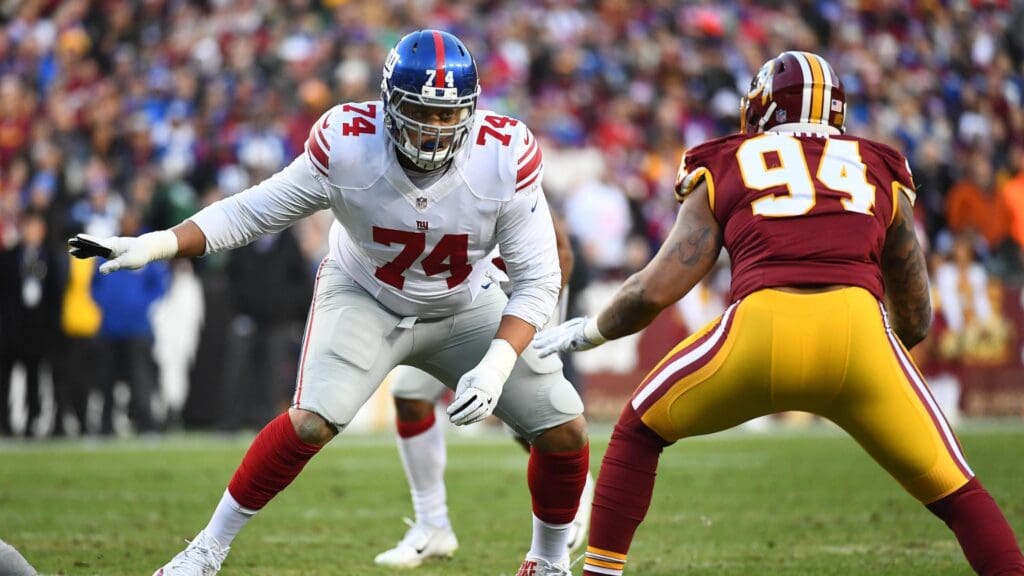 Jan 1, 2017; Landover, MD, USA; New York Giants offensive tackle Ereck Flowers (74) prepares to block Washington Redskins linebacker Preston Smith (94) during the first half at FedEx Field.