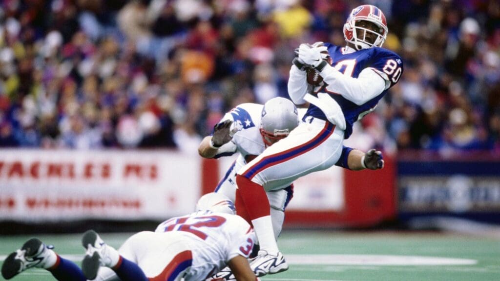 Nov 15, 1998; Orchard Park, NY, USA; Buffalo Bills receiver Eric Moulds (80) makes a catch against the New England Patriots at Rich Stadium. FILE PHOTO