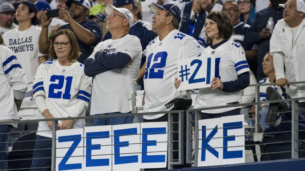 Jan 5, 2019; Arlington, TX, USA; Fans cheer of Dallas Cowboys running back Ezekiel Elliott (not pictured) look on during the fourth quarter against the Seattle Seahawks in a NFC Wild Card playoff football game at AT&T Stadium.