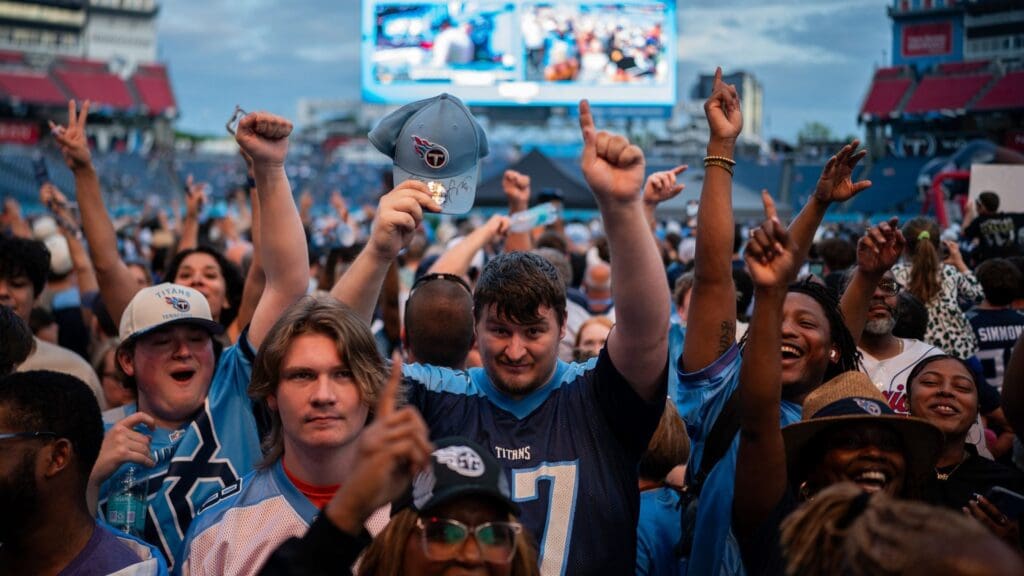 Fans cheer as the Tennessee Titans select Miami Hurricanes quarterback Cam Ward with the first overall pick during the Titans NFL Draft Watch Party at Nissan Stadium in Nashville, Tenn., Thursday, April 24, 2025.