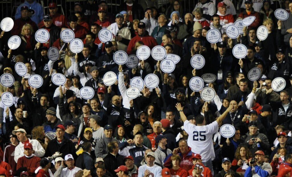 Nov 1, 2009; Philadelphia, PA, USA; Fans of the New York Yankees hold up signs during the first inning of game four of the 2009 World Series against the Philadelphia Phillies at Citizens Bank Park.