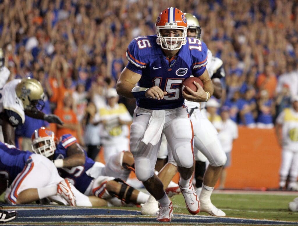 Florida Gators quarterback Tim Tebow (15) scores a touchdown during the first half against the Charleston Southern Buccaneers at Ben Hill Griffin Stadium