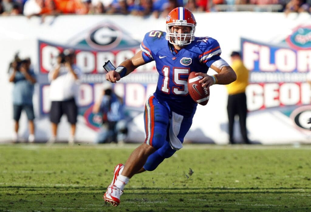 October 31, 2009; Jacksonville FL, USA; Florida Gators quarterback Tim Tebow (15) runs with the ball during the first half against Georgia Bulldogs at Jacksonville Municipal Stadium.