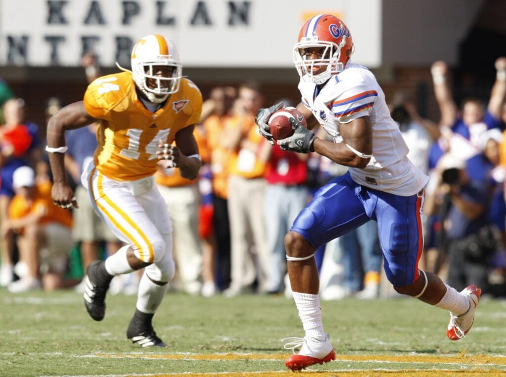 September 20, 2008; Knoxville, TN, USA; Florida Gators wide receiver Percy Harvin (1) runs past Tennessee Volunteers safety Eric Berry (14) after a catch in the first half at Neyland Stadium. The Gators defeated the Volunteers 30-6