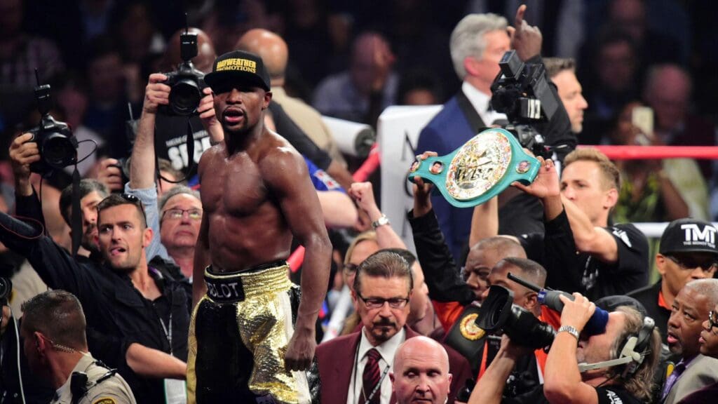 May 2, 2015; Las Vegas, NV, USA; Floyd Mayweather celebrates after defeating Manny Pacquiao (not pictured) via unanimous decision during their world welterweight championship bout at MGM Grand Garden Arena.