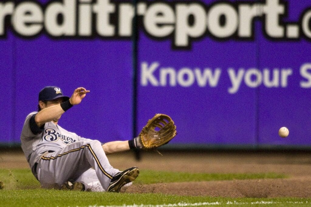 September 2, 2009; St. Louis, MO, USA; Milwaukee Brewers right fielder Frank Catalanotto (27) slides for a ball hit by St. Louis Cardinals first baseman Albert Pujols (5) (not pictured) in the second inning at Busch Stadium. St. Louis defeated Milwaukee 10-3.