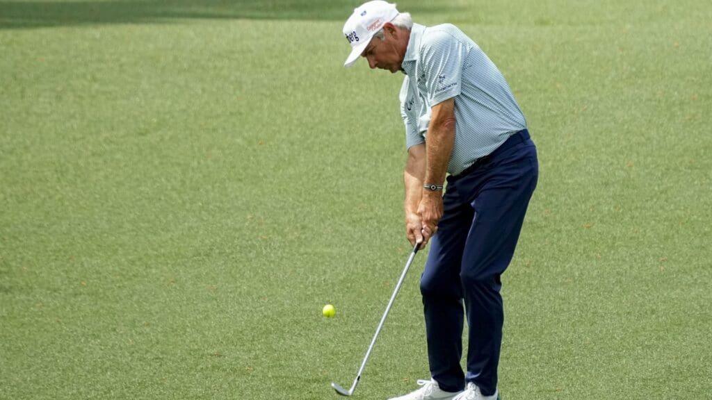 Apr 11, 2024; Augusta, Georgia, USA; Fred Couples hits onto the no. 2 green during the first round of the Masters Tournament.
