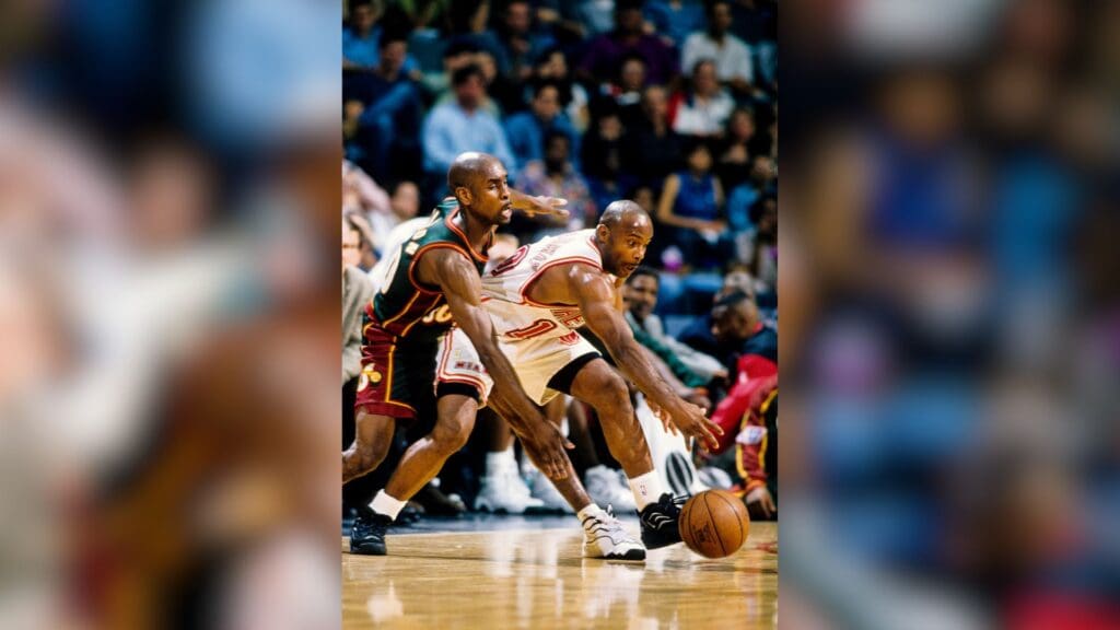 Feb 28, 1997; Miami, FL; USA; FILE PHOTO; Miami Heat guard Tim Hardaway (10) in action against Seattle Seattle Supersonics guard Gary Payton (20) at the Miami Arena.