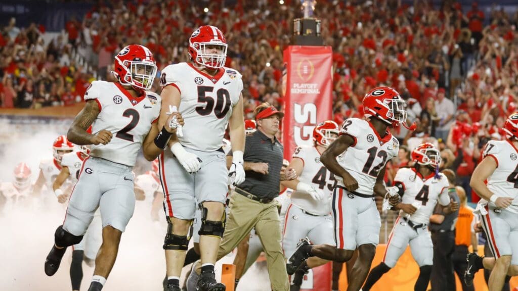 Dec 31, 2021; Miami Gardens, Florida, USA; Georgia Bulldogs players take the field prior to the game against the Michigan Wolverines during the Orange Bowl college football CFP national semifinal game at Hard Rock Stadium.