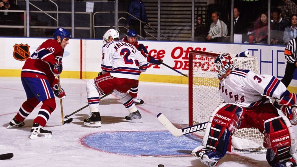 Unknown Date, 2002; New York, NY, USA; FILE PHOTO; New York Rangers goalie Mike Richter (35) and Vladimir Malakhov (23) in action against Montreal Canadiens right wing Gino Odjick (29) at Madison Square Garden.