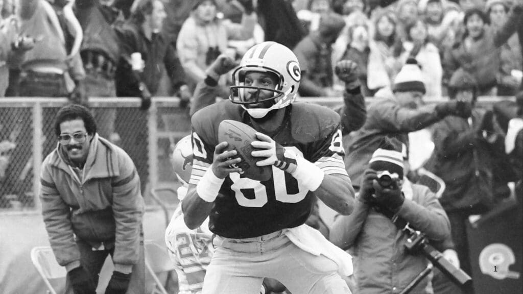 Green Bay Packers James Lofton (80) after scoring a touchdown against the Detroit Lions on Dec. 6, 1981, at Lambeau Field in Green Bay, Wis. The Packers defeated the Lions 31-17.