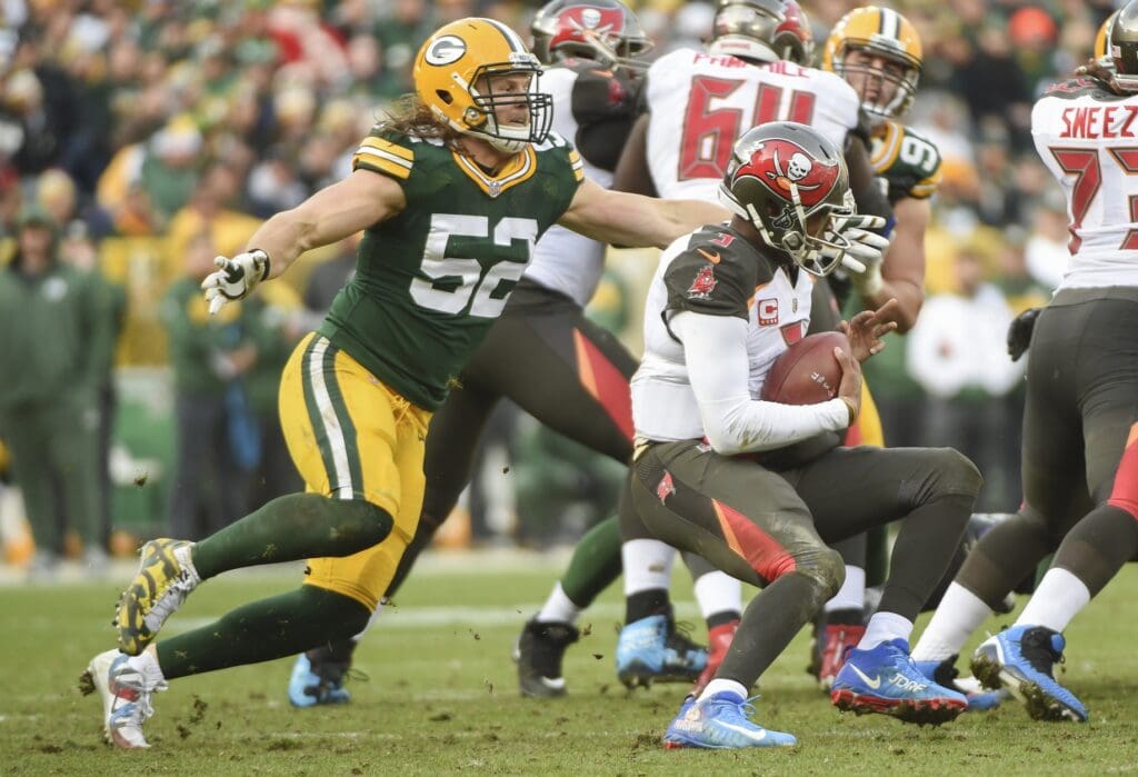 Dec 3, 2017; Green Bay, WI, USA; Green Bay Packers linebacker Clay Matthews (52) sacks Tampa Bay Buccaneers quarterback Jameis Winston (3) in the third quarter at Lambeau Field.