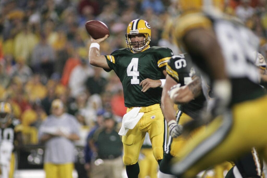 August 11, 2005; Green Bay, WI, USA; Green Bay Packers quarterback #4 Brett Favre throws a pass during the first quarter of the game against the San Diego Chargers at Lambeau Field.