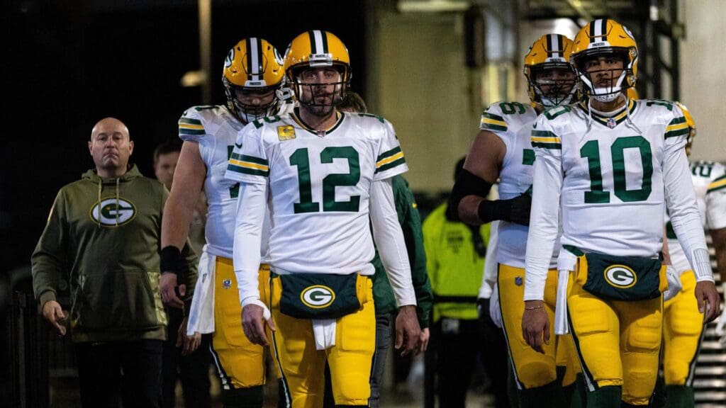 Nov 27, 2022; Philadelphia, Pennsylvania, USA; Green Bay Packers quarterback Aaron Rodgers (12) and quarterback Jordan Love (10) lead their team out of the tunnel before action Philadelphia Eagles at Lincoln Financial Field