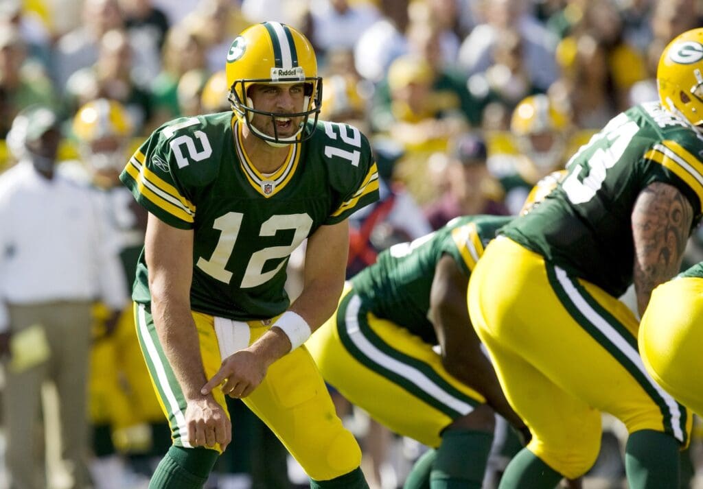 Sep 20, 2009; Green Bay, WI, USA; Green Bay Packers quarterback Aaron Rodgers (12) audibles during the game against the Cincinnati Bengals at Lambeau Field. The Bengals defeated the Packers 31-24.