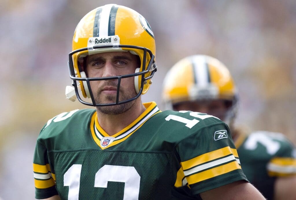 Sep 20, 2009; Green Bay, WI, USA; Green Bay Packers quarterback Aaron Rodgers (12) looks on during a time out during the game against the Cincinnati Bengals at Lambeau Field. The Bengals defeated the Packers 31-24.