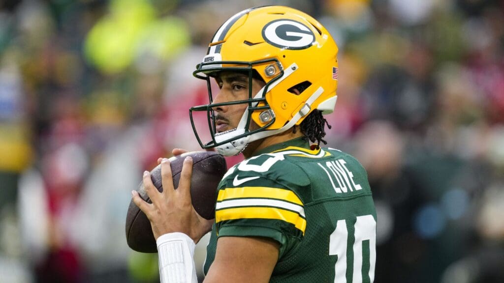 Nov 24, 2024; Green Bay, Wisconsin, USA; Green Bay Packers quarterback Jordan Love (10) throws a pass during warmups prior to the game against the San Francisco 49ers at Lambeau Field.