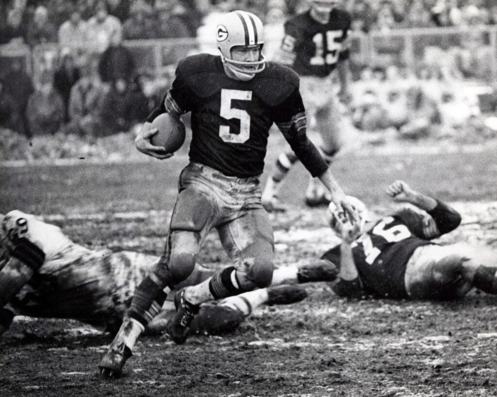 Jan 2, 1966; Green Bay , WI, USA; FILE PHOTO; Green Bay Packers running back Paul Hornung (5) during the 1965 NFL Championship game against the Cleveland Browns at Lambeau Field. The Packers defeated the Browns 23-12.
