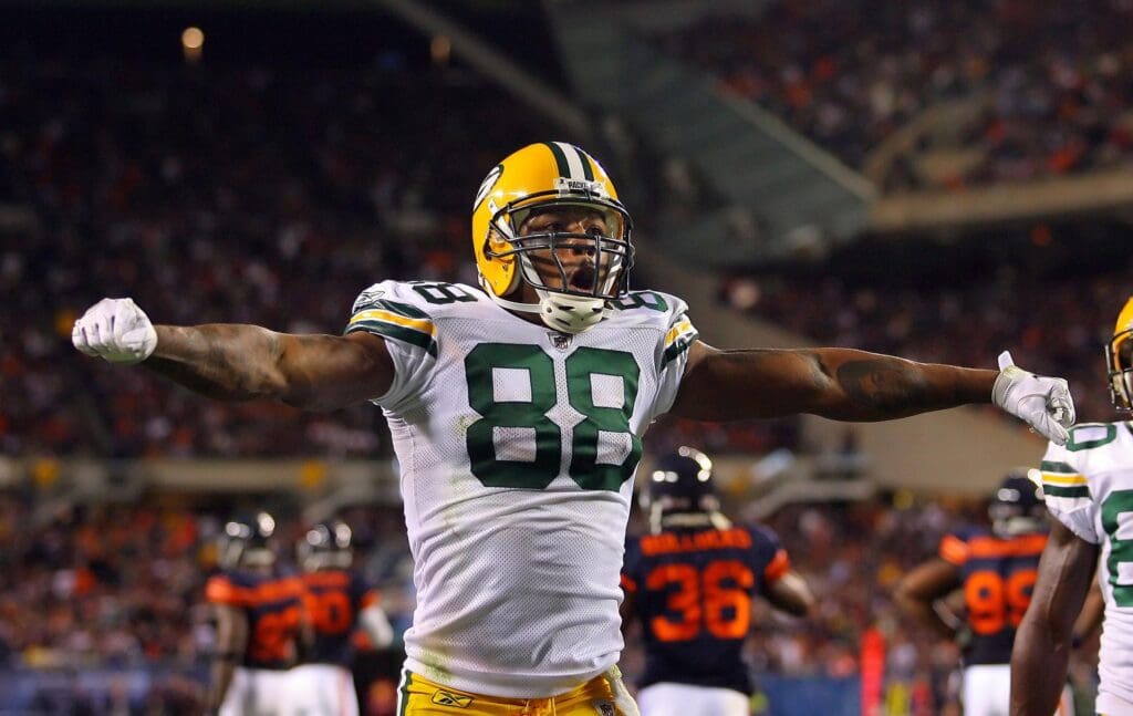 Sep 27, 2010; Chicago, IL, USA; Green Bay Packers tight end Jermichael Finley (88) celebrates scoring an apparent touchdown in the second quarter of a game against the Chicago Bears at Soldier Field. The touchdown was nulified by a penalty.