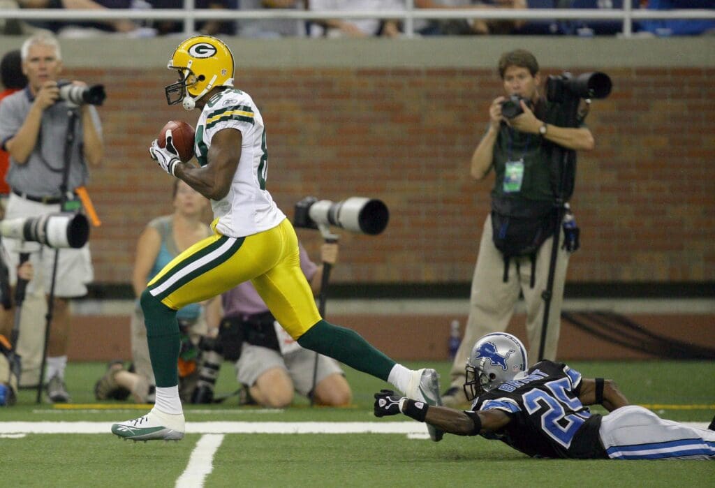 September 11, 2005; Detroit, MI, USA; Green Bay Packers wide receiver #84 Javon Walker makes a big gain on a pass from Brett Favre(not pictured) in the 3rd quarter against the Detroit Lions at Ford Field. The Packers were penalized for offensive pass interference and the play was called back.