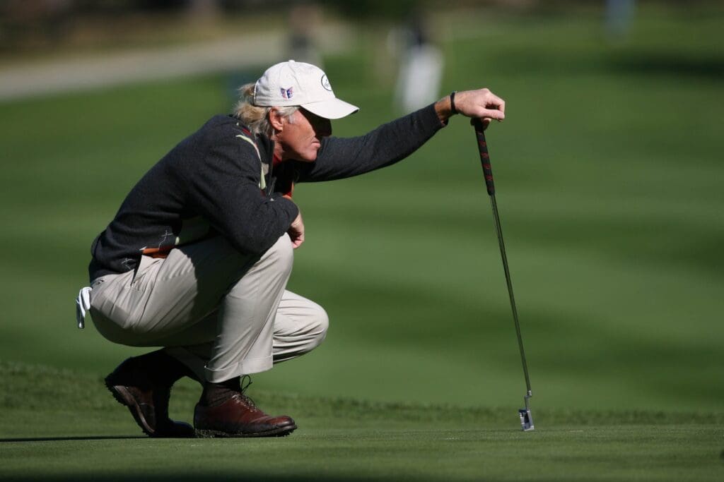 Feb. 8, 2008; Pebble Beach, CA, USA; Greg Norman lines up his putt on the 17th hole during the second round of the AT&T Pebble Beach National Pro-Am golf tournament at the Spyglass Hill in Pebble Beach, CA.
