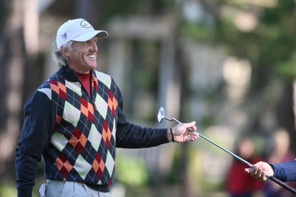 Greg Norman smiles after making a putt on the 17th hole during the second round of the AT&T Pebble Beach National Pro-Am golf tournament at the Spyglass Hill in Pebble Beach, CA.