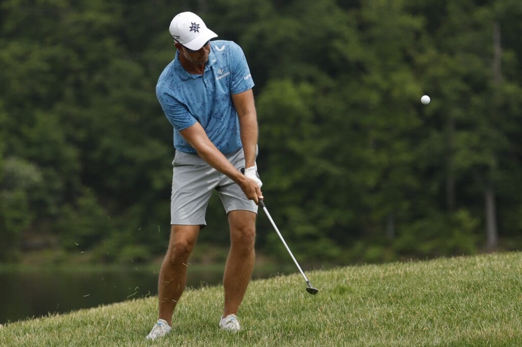 Henrik Stenson of team Majestic GC pitches onto the twelfth green during the first round of the LIV Golf Virginia golf tournament at Robert Trent Jones Golf Club.