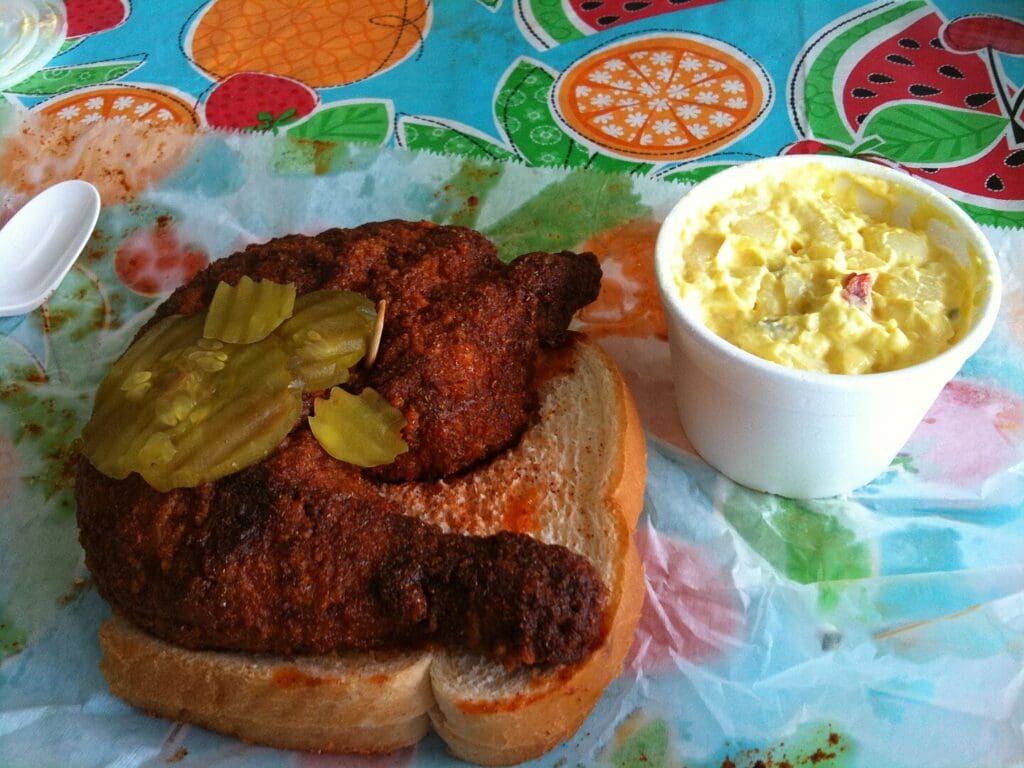 Nashville-style hot chicken with traditional accompaniments