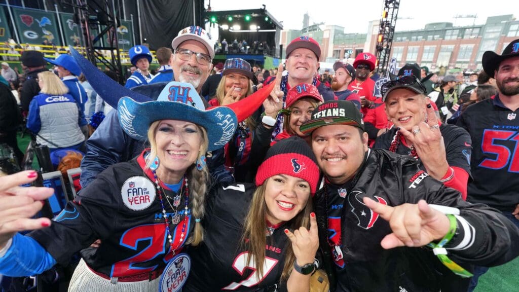 Apr 24, 2025; Green Bay, WI, USA; Houston Texans fans Patti Cream and Danny Cream pose during the NFL Draft at Lambeau Field.