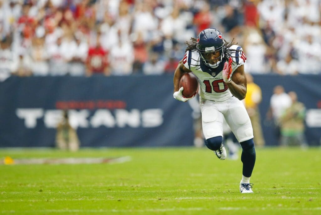 Sep 7, 2014; Houston, TX, USA; Houston Texans wide receiver DeAndre Hopkins (10) runs for a touchdown during the game against the Washington Redskins at NRG Stadium. 