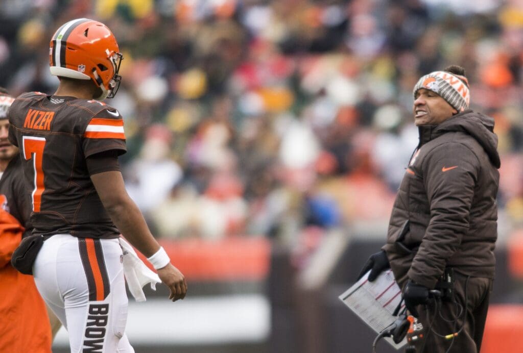 Dec 10, 2017; Cleveland, OH, USA; Cleveland Browns head coach Hue Jackson talks with quarterback DeShone Kizer (7) during a timeout in the second quarter at FirstEnergy Stadium.