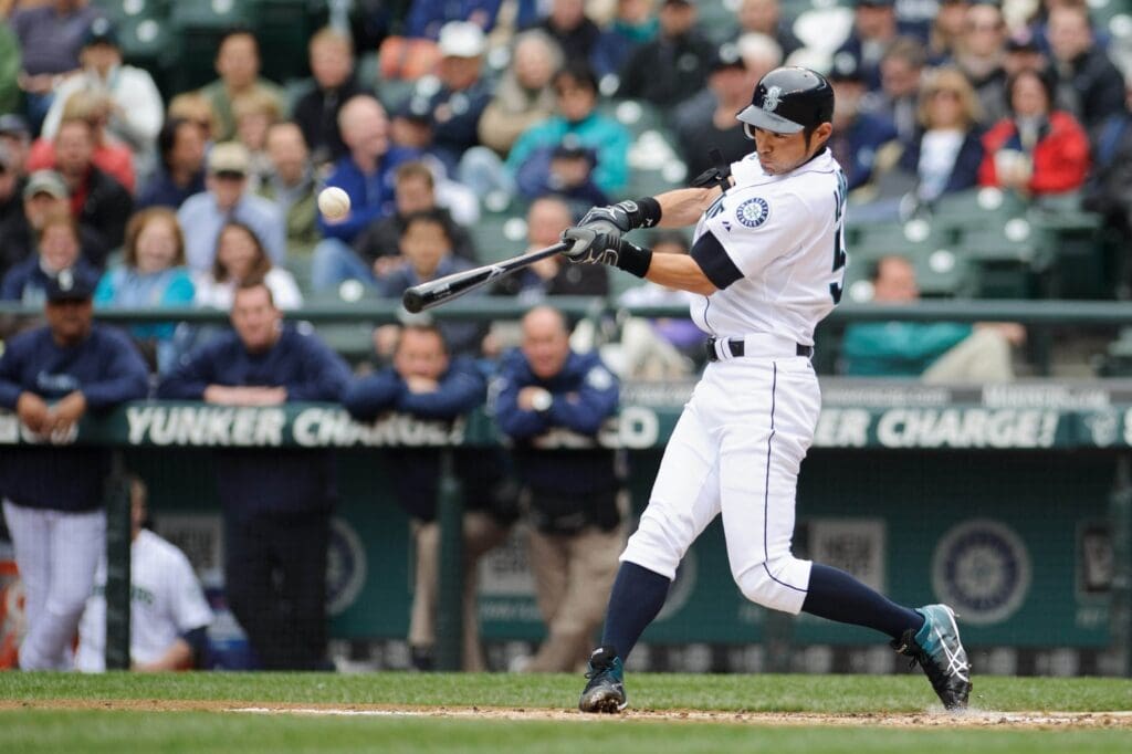 May 23, 2012; Seattle, WA, USA; Seattle Mariners right fielder Ichiro Suzuki (51) hits the ball during the game against the Seattle Mariners at Safeco Field. Seattle defeated Texas 5-3.