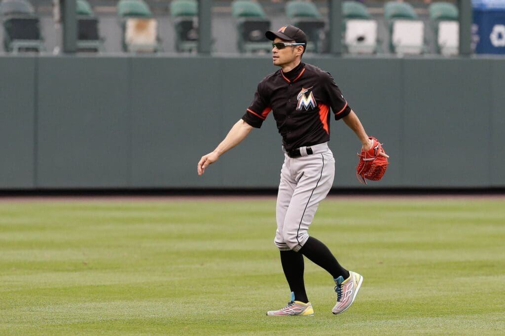 Aug 5, 2016; Denver, CO, USA; Miami Marlins right fielder Ichiro Suzuki (51) warms up prior to the game against the Colorado Rockies at Coors Field.