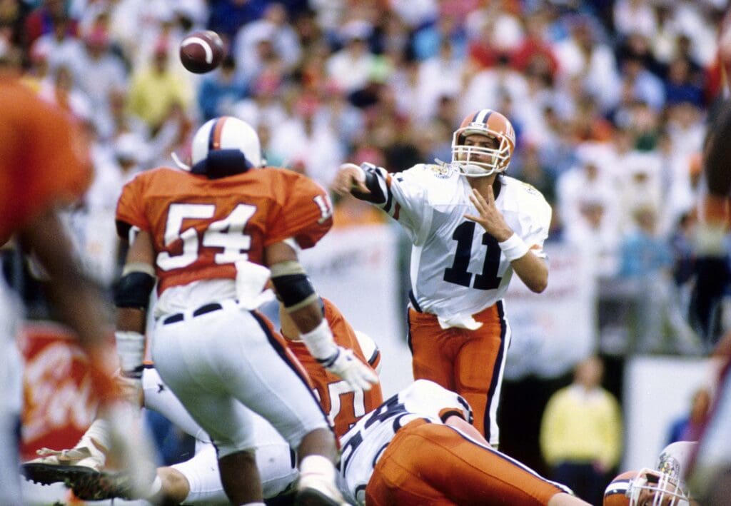 Jan 1, 1990; Orlando, FL, USA; FILE PHOTO; Illinois Fighting Illini quarterback Jeff George (11) in action against the Virginia Cavaliers at the 1990 Citrus Bowl, Illinois defeated Virginia 31-21.