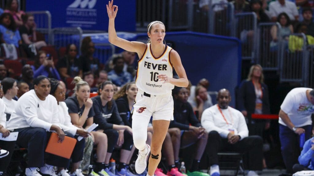Jun 7, 2025; Chicago, Illinois, USA; Indiana Fever guard Lexie Hull (10) celebrates after scoring against the Chicago Sky during the second half of a WNBA game at United Center.